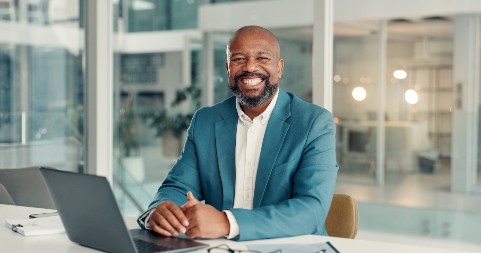 A confident Bay Area accounting firm owner in a bright office